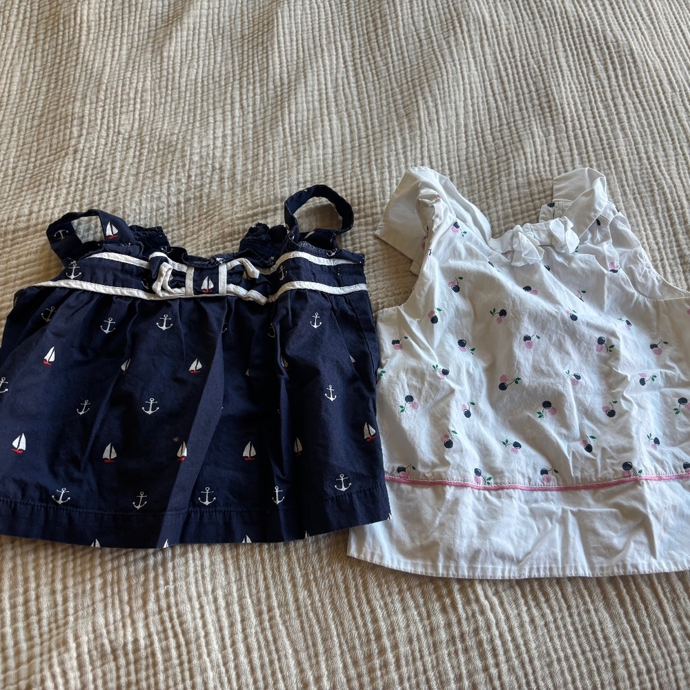 2 sleeveless shirts